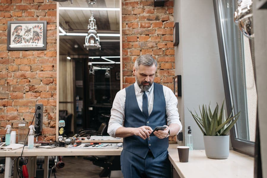 Business owner checking WhatsApp messages between clients